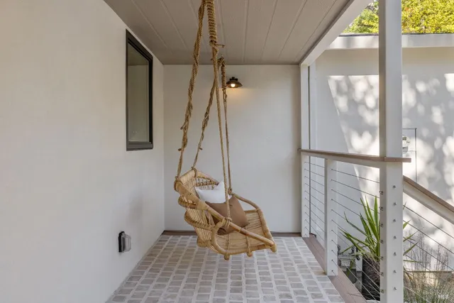 a view of a dining room with furniture window and outside view