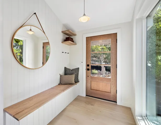 a kitchen with a stove a sink and a refrigerator