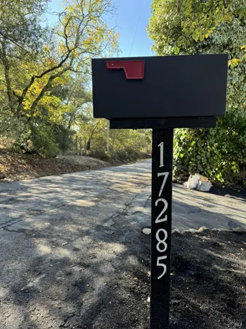 a kitchen with a stove a sink and a refrigerator