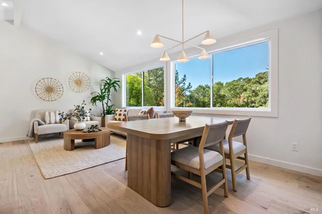 a spacious bedroom with a bed and a couch