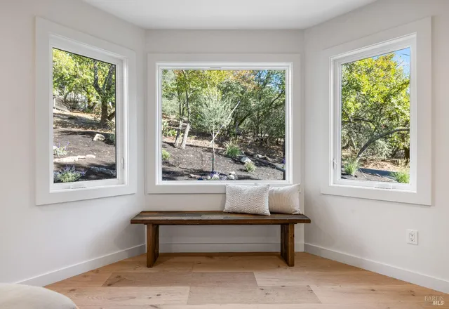 a front view of a house with entryway and table