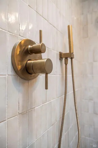 a front view of a house with entryway and table