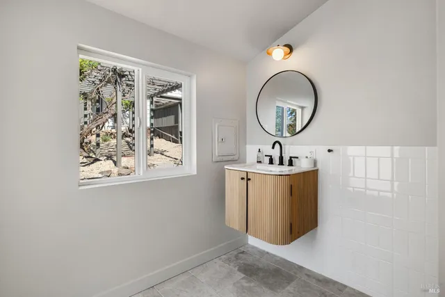 an aerial view of a house with mountain view