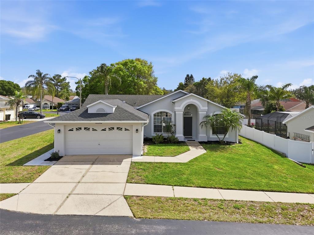 10542 Bucks Run New Port Richey, FL 34654 - Photo 1 of 1 a view of a house with a yard