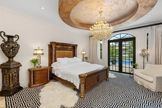 a en suite bathroom with a granite countertop tub sink and window
