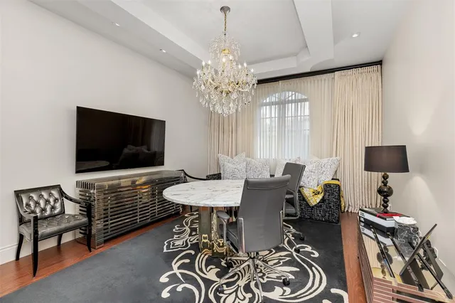 a bathroom with a sink a toilet and shower curtain