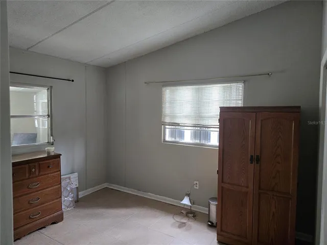 a room with closet and window