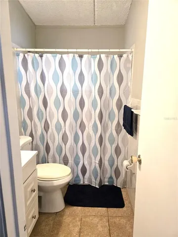 a bathroom with a sink a toilet and a bathtub