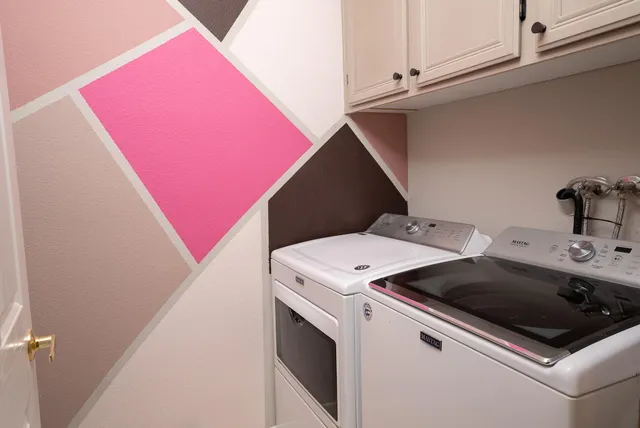 a close up view of washer and dryer