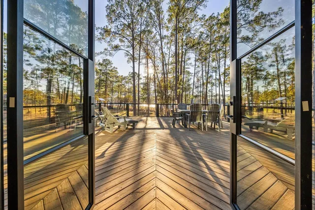 a view of a balcony with chairs