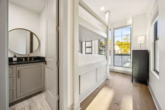 a kitchen with a refrigerator and a stove