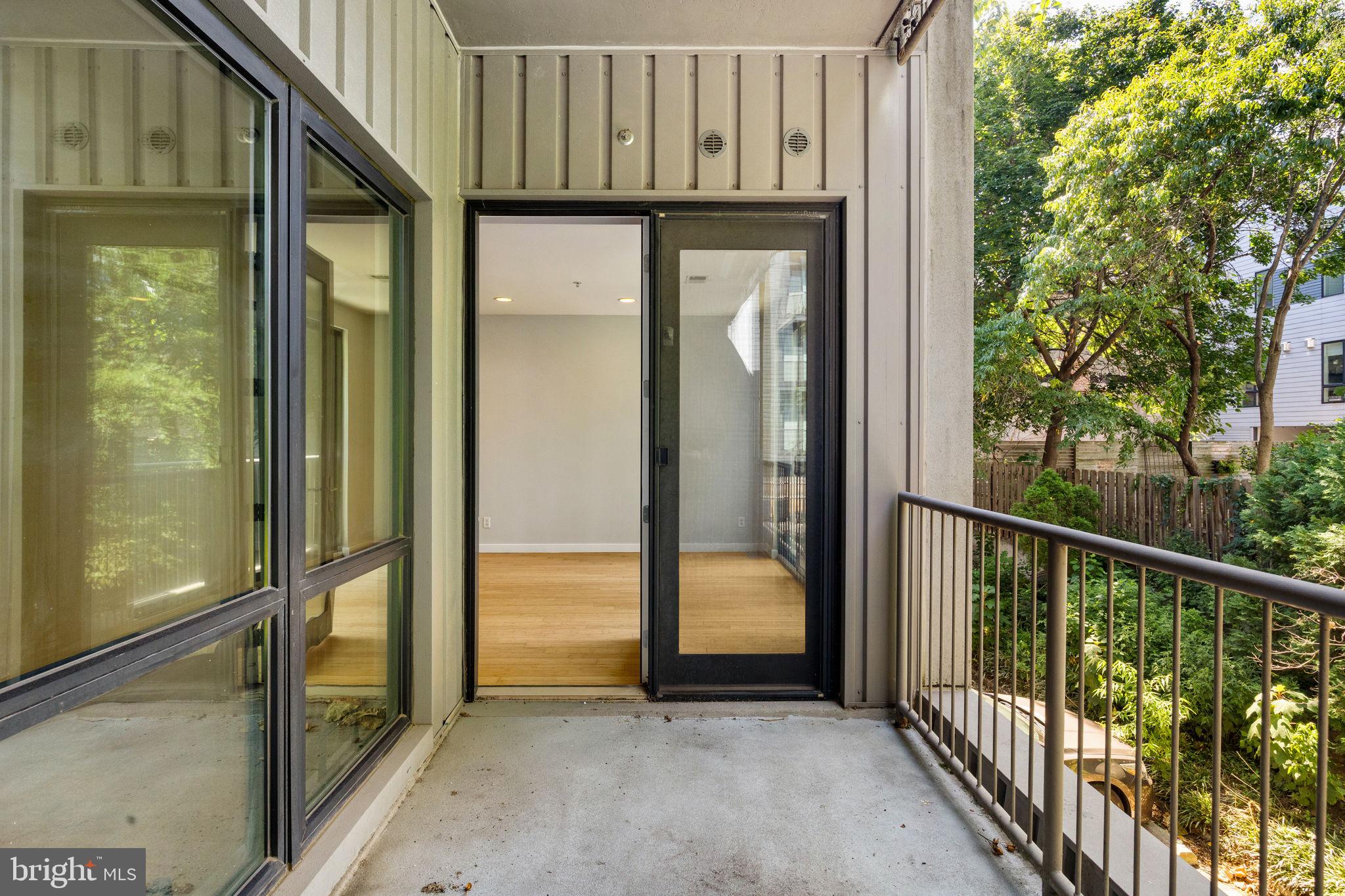 934 North 3rd Street, Unit 205 Philadelphia, PA 19123 - Photo 15 of 39 a view of a glass door with a balcony