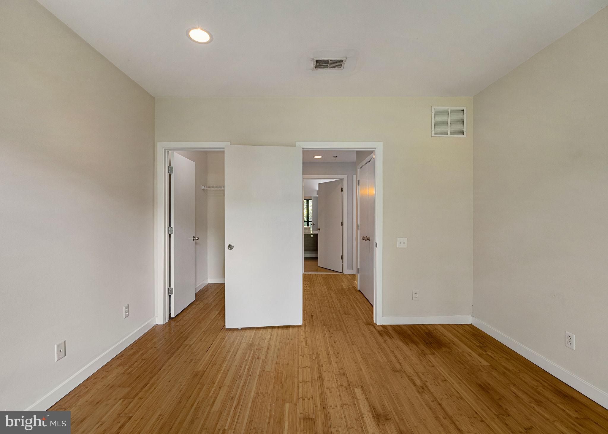 934 North 3rd Street, Unit 205 Philadelphia, PA 19123 - Photo 16 of 39 a view of a hallway with wooden floor