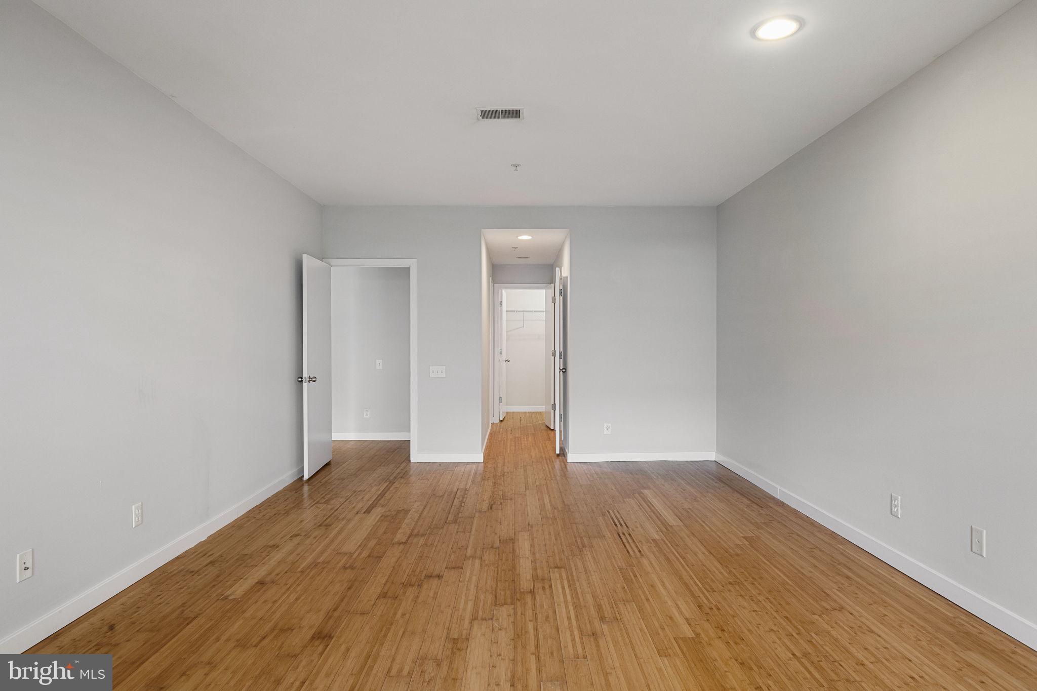 934 North 3rd Street, Unit 205 Philadelphia, PA 19123 - Photo 24 of 39 a view of room with wooden floor