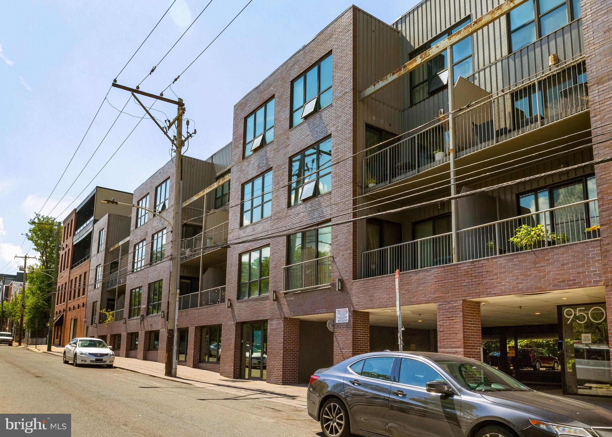 934 North 3rd Street, Unit 205 Philadelphia, PA 19123 - Photo 39 of 39 a car parked in front of a building