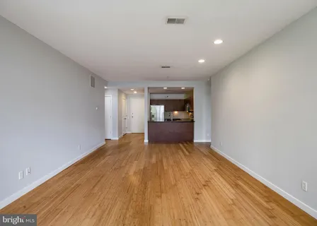 a view of kitchen with wooden floor