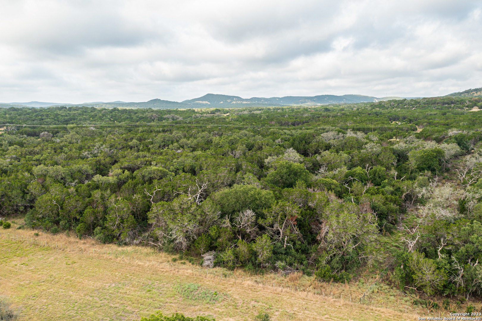 0 Wharton's Dock Road Bandera, TX 78003 - Photo 11 of 51 a view of a big yard of the house