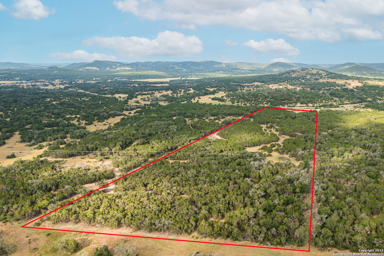 0 Wharton's Dock Road Bandera, TX 78003 - Photo 3 of 51 a view of a city with mountains in the background