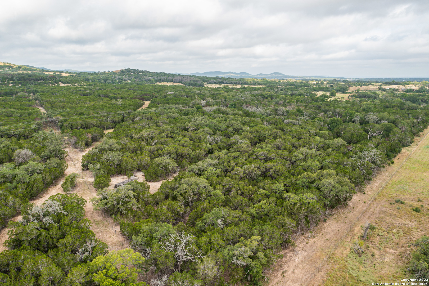 0 Wharton's Dock Road Bandera, TX 78003 - Photo 6 of 51 a view of a city with lush green forest