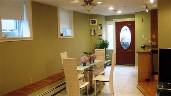 53 Corey Street, Unit B Everett, MA 02149 - Photo 12 of 30 a workspace with furniture and a mirror