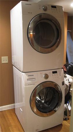 53 Corey Street, Unit B Everett, MA 02149 - Photo 15 of 30 a utility room with dryer and washer