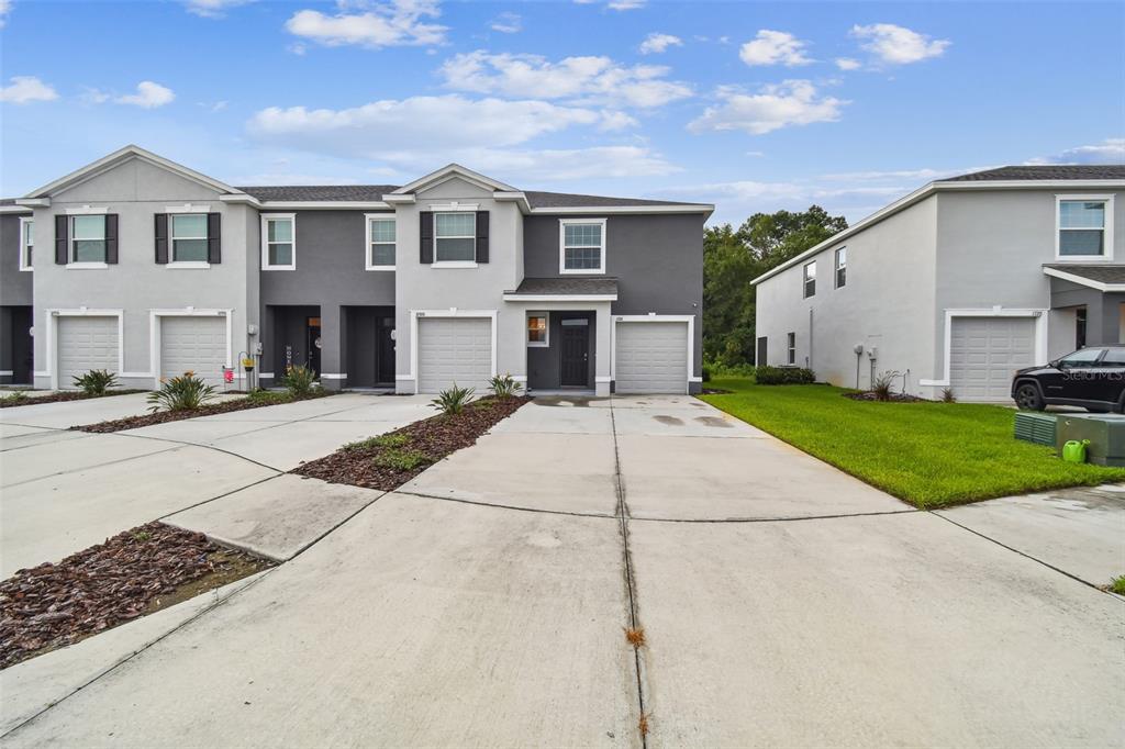 1726 Hubbell Road Wesley Chapel, FL 33543 - Photo 1 of 1 End unit with Extra long driveway