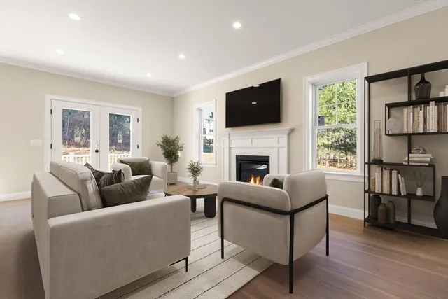 a living room with furniture fireplace and a flat screen tv