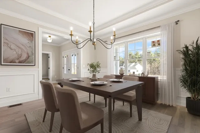 a large kitchen with kitchen island granite countertop a large center island a sink stainless steel appliances and cabinets