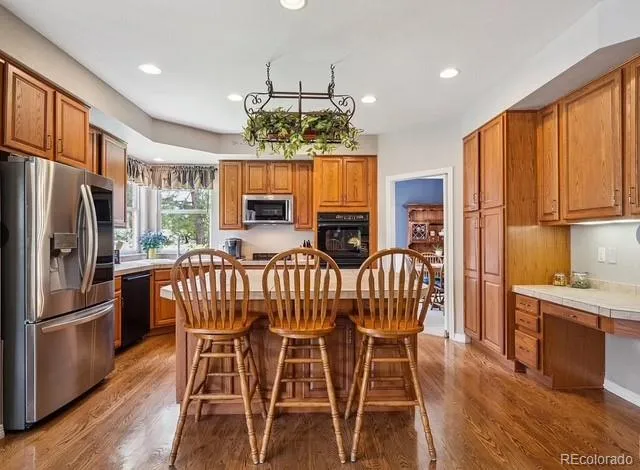a bathroom with a sink toilet and a mirror