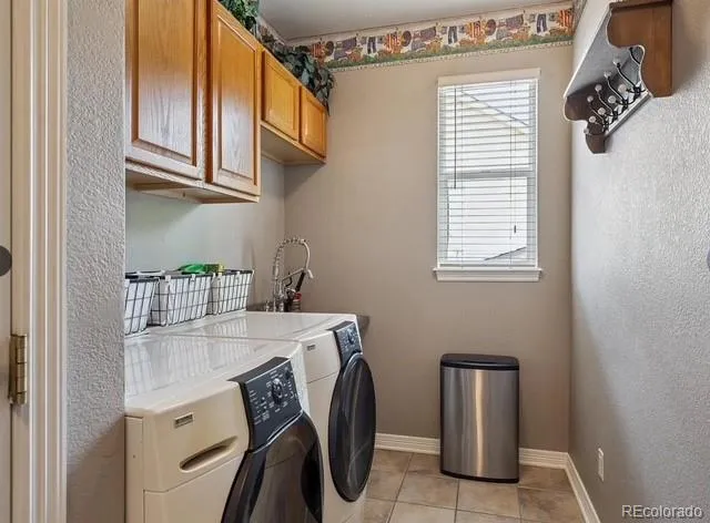 a room with a bed a flat screen tv and a large window with the outer view