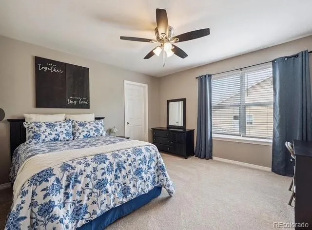 a spacious bathroom with a double vanity sink a mirror and a shower
