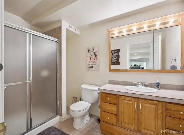 a view of deck with furniture and barbeque oven