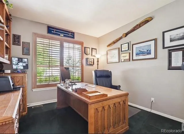a kitchen with stainless steel appliances granite countertop a stove and a refrigerator