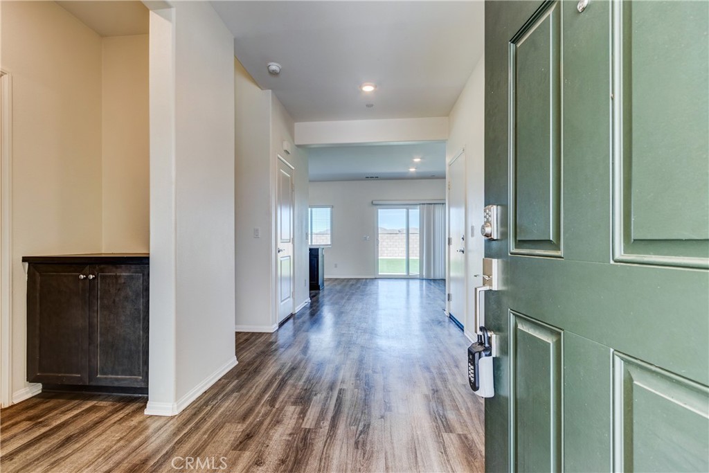 28295 Memory Lane Winchester, CA 92596 - Photo 11 of 68 a view of hallway with wooden floor