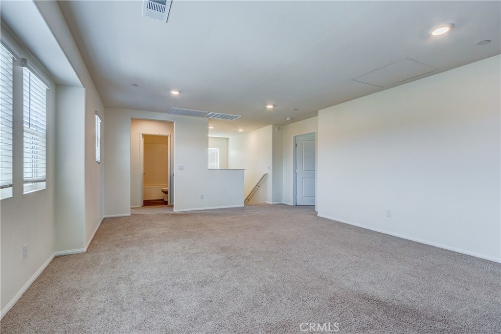 28295 Memory Lane Winchester, CA 92596 - Photo 26 of 68 an empty room with windows and closet