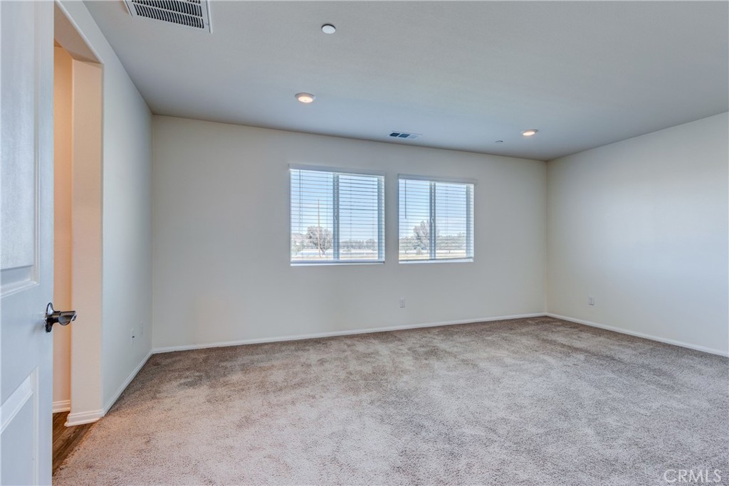 28295 Memory Lane Winchester, CA 92596 - Photo 27 of 68 a view of an empty room with a window