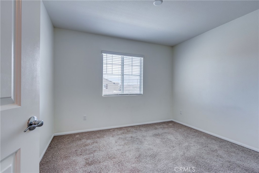 28295 Memory Lane Winchester, CA 92596 - Photo 35 of 68 an empty room with a window