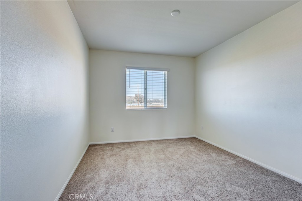 28295 Memory Lane Winchester, CA 92596 - Photo 37 of 68 an empty room with a window