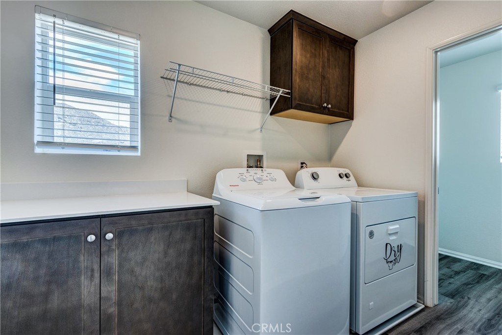 28295 Memory Lane Winchester, CA 92596 - Photo 39 of 68 a utility room with dryer and washer