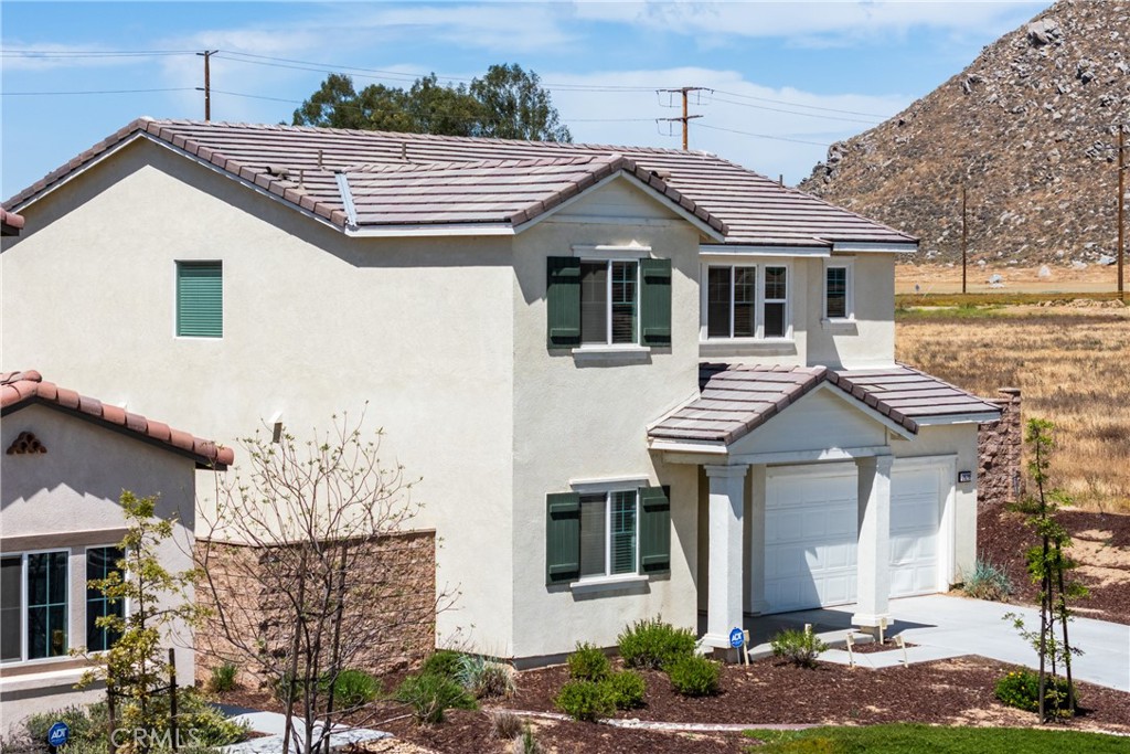 28295 Memory Lane Winchester, CA 92596 - Photo 56 of 68 a front view of a house with a yard