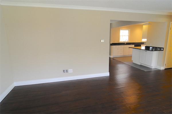 96 Adams Road Grafton, MA 01536 - Photo 11 of 24 an empty room with wooden floor and windows