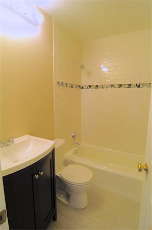 96 Adams Road Grafton, MA 01536 - Photo 13 of 24 a bathroom with a sink a toilet and shower