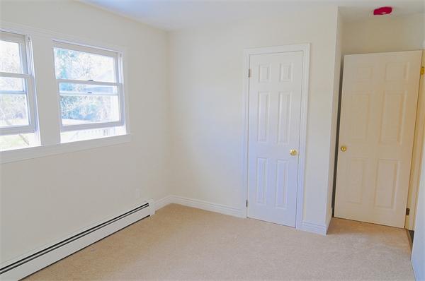 96 Adams Road Grafton, MA 01536 - Photo 20 of 24 an empty room with windows