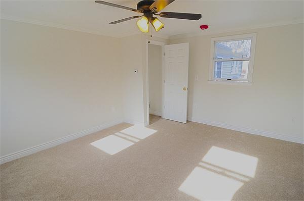 96 Adams Road Grafton, MA 01536 - Photo 22 of 24 a view of an empty room with a window