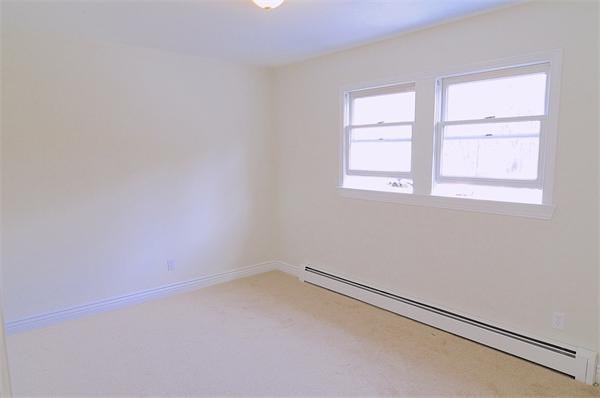 96 Adams Road Grafton, MA 01536 - Photo 23 of 24 an empty room with a window