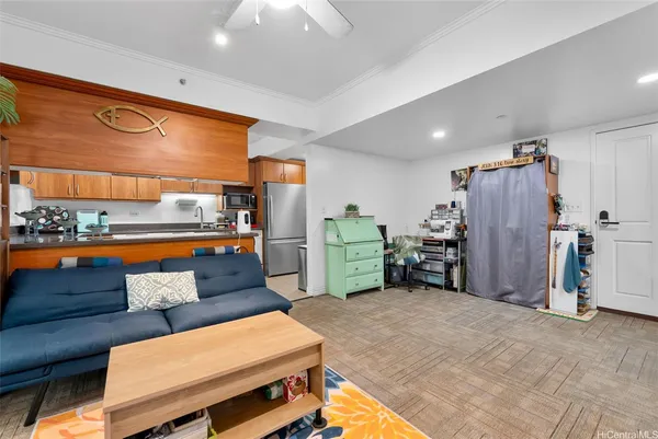 a kitchen with stainless steel appliances granite countertop a sink a stove and a microwave