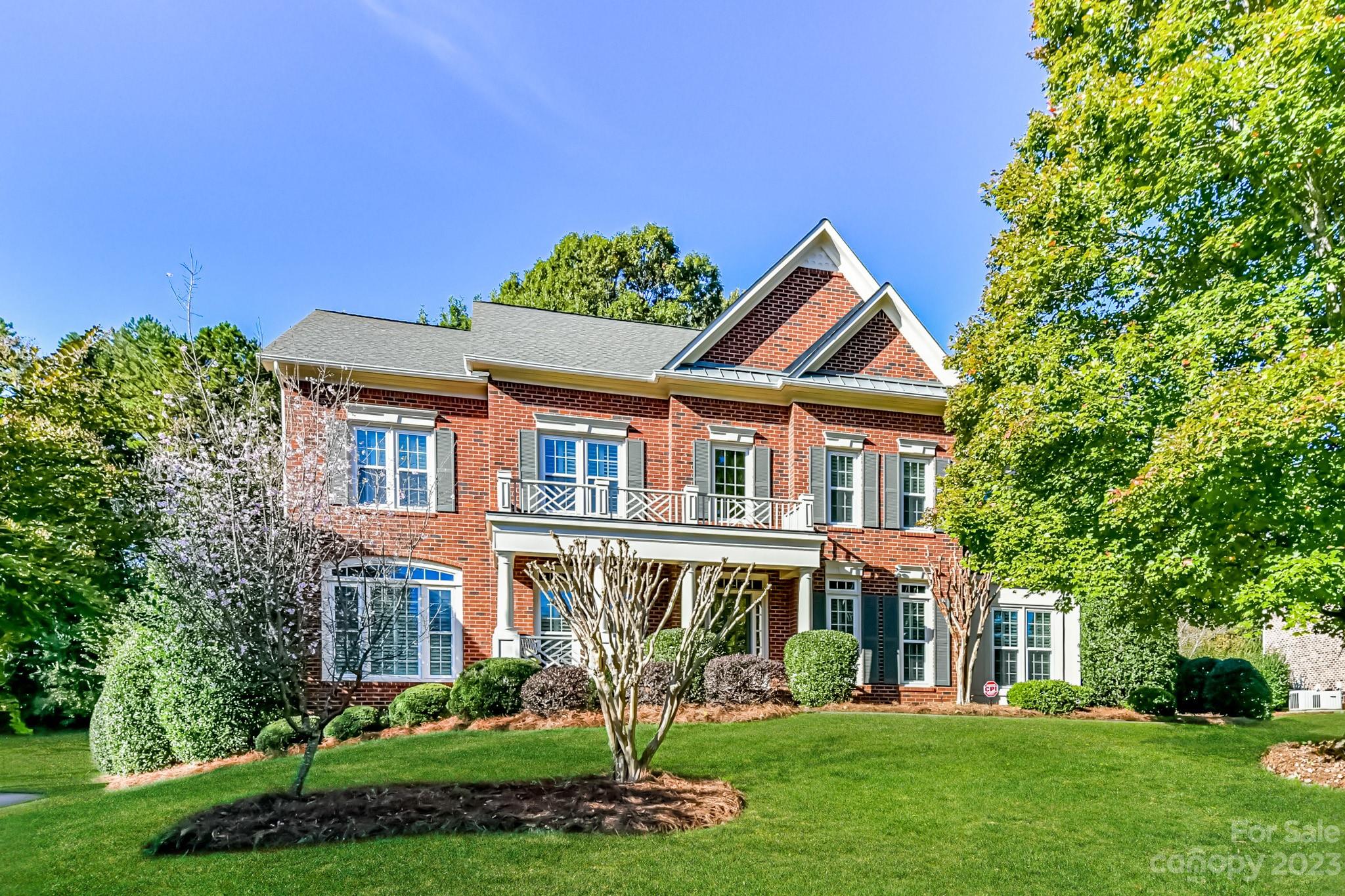 4030 Fawn Hill Road Matthews, NC 28105 - Photo 1 of 48 a front view of a house with a yard