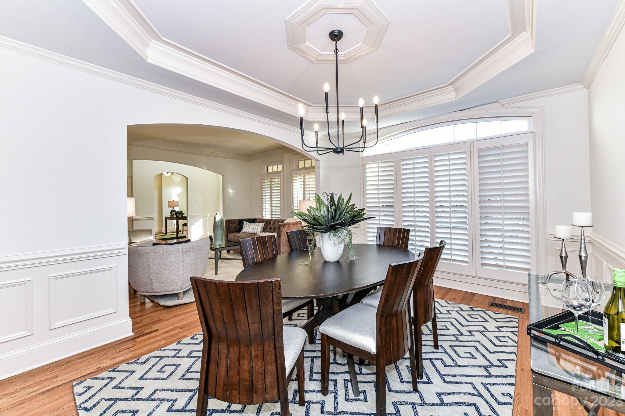 4030 Fawn Hill Road Matthews, NC 28105 - Photo 13 of 48 a view of a dining room with furniture window and wooden floor