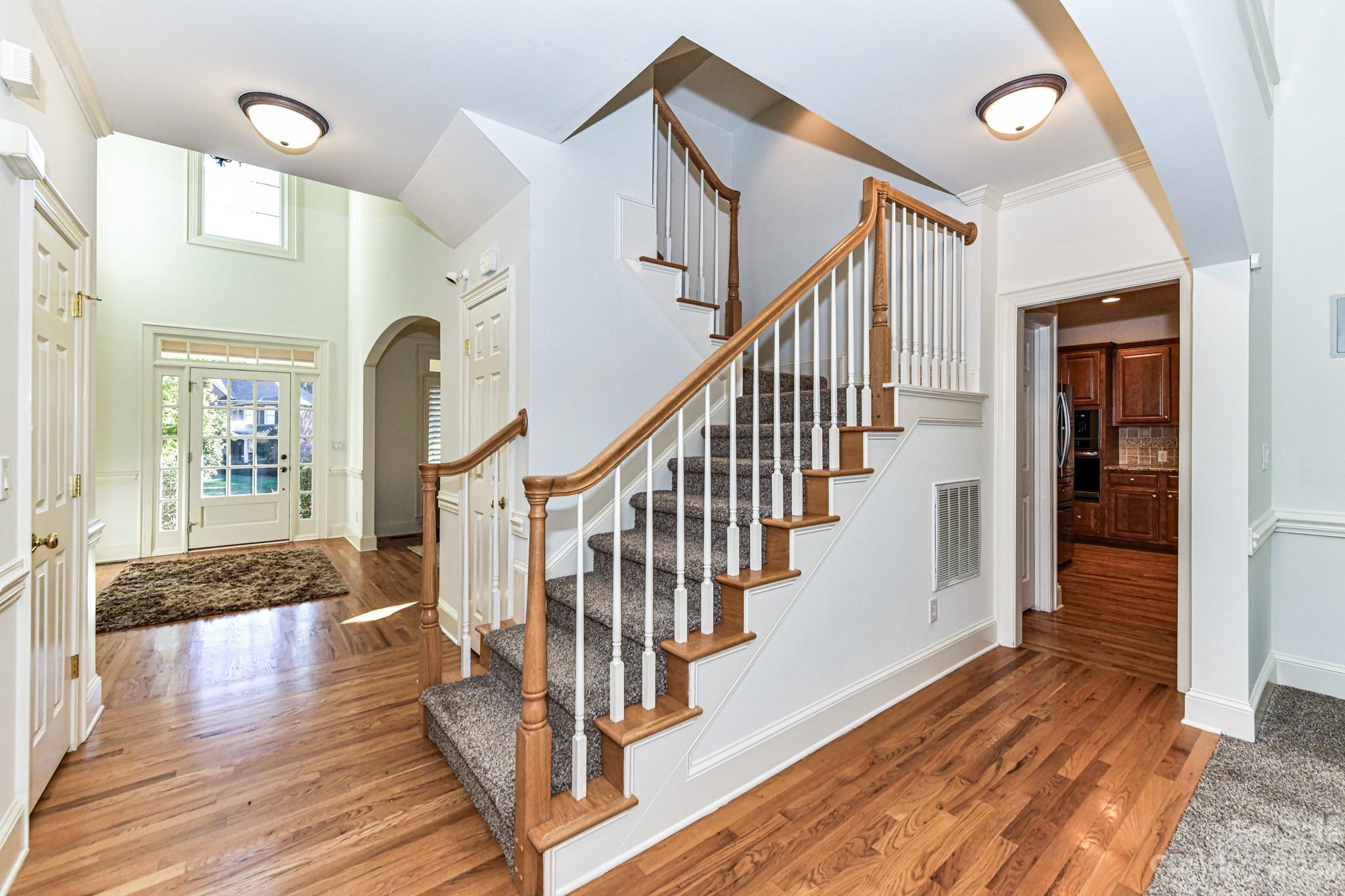 4030 Fawn Hill Road Matthews, NC 28105 - Photo 18 of 48 a view of entryway and hall with wooden floor