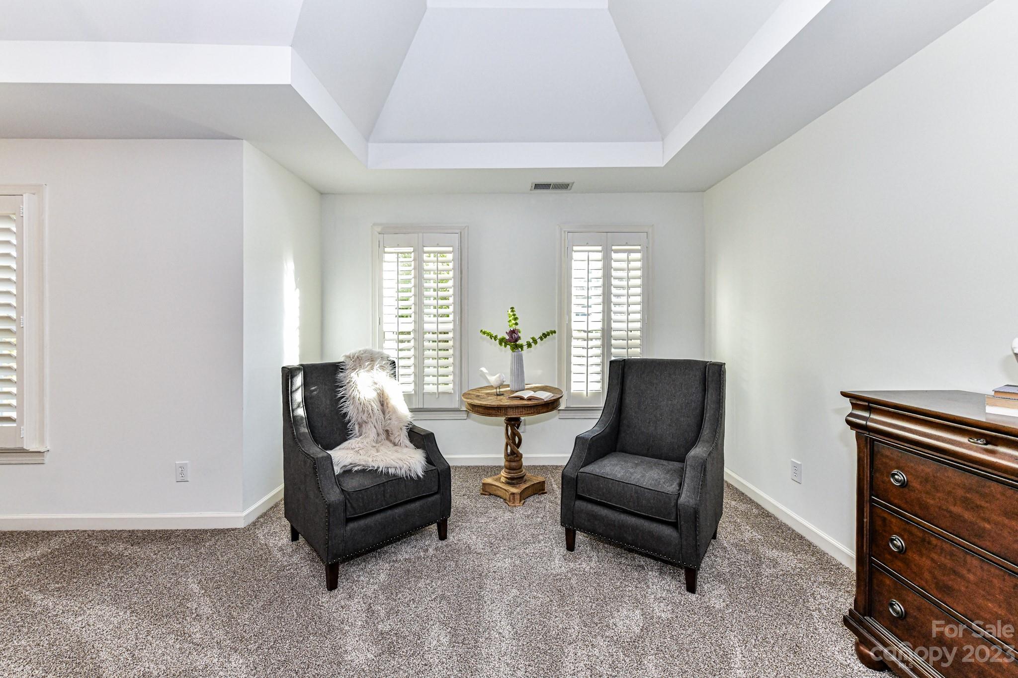 4030 Fawn Hill Road Matthews, NC 28105 - Photo 22 of 48 a living room with furniture and two windows
